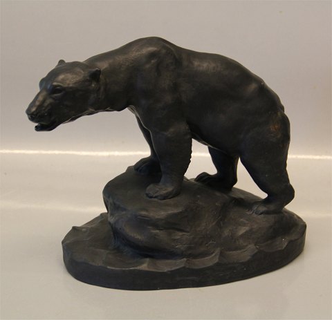 Ipsen Danish Art Pottery 1843-1955 787 Polar bear Lauritz Jensen Black Glazed 
August 1904  17 x 24 cm
