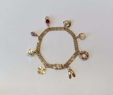Bismarck armlænke i 8kt med charms i 14kt. 19cm.