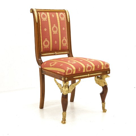 French bronzemounted Empire chair. Circa 1820. H: 
95cm