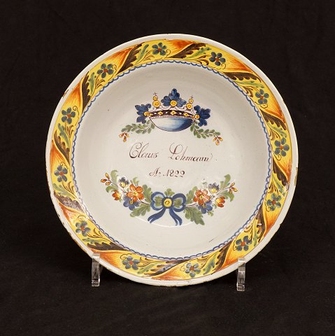 Deep plate from Kellinghusen, faience. Dated 1822. 
D: 22cm