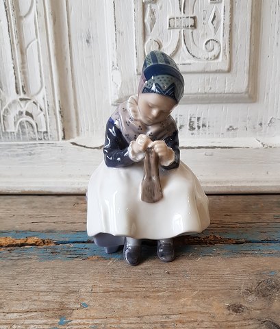 Royal Copenhagen Figurine no. 1314, girl in national dress from Amager.