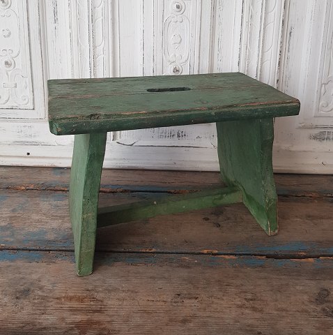 Lovely old green painted stool