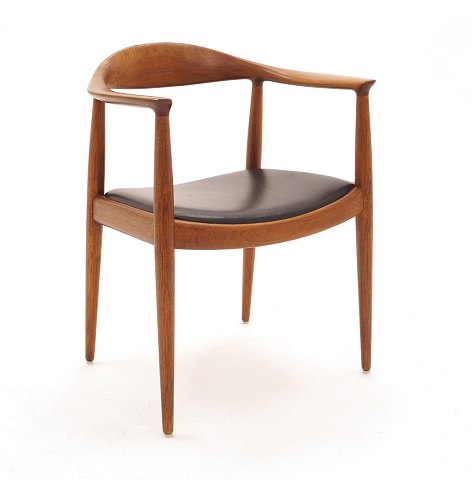 Hans J. Wegner, 1914-2007: The Chair, teak. The 
back of the chair restored. Seat with black 
leather