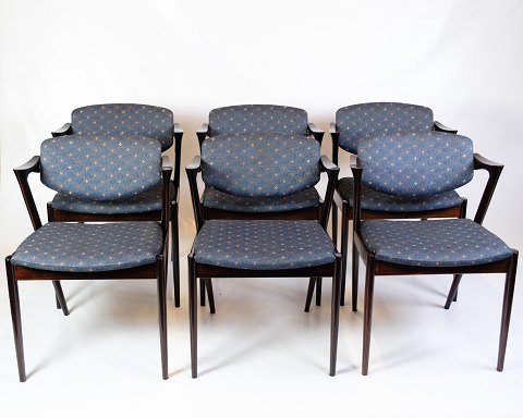 Sæt Af Seks Spisebordsstole - Model 42 - Mørkt Træ - Blomstret Stof - Kai 
Kristiansen - Schou Andersen - 1960erne
Flot stand

