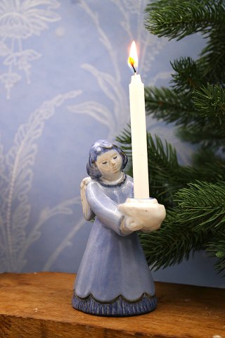 L. Hjorth ceramic large angel with blue glaze holding a small candle. No.419. 
H: 14cm...