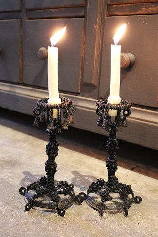 A pair of antique candlesticks in Fil de Fer (metal work) 
with a really nice dark patina...