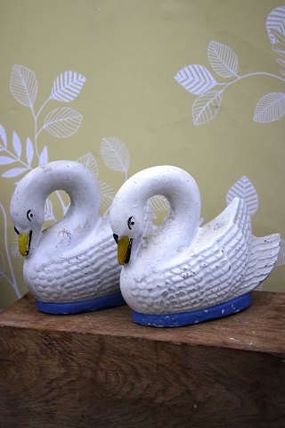 Decorative, old swan in sandstone with old paint and a fine patina...