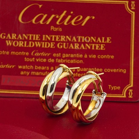 Cartier; Pair of medium Trinity earrings in 18k gold