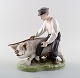 Royal Copenhagen figurine, farmer with pig. 
Decoration number 848.