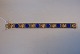 Antik Huset 
presents: 
Gold 
Bracelet with 
lapis, 14 Carat 
Gold