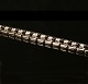 Armband mit 15 Diamanten. 14kt Weissgold. L: 20,5cm