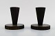 Tinos art deco, a pair of candlesticks in bronze.