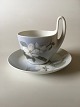 Royal Copenhagen Art Nouveau Small High Handled Cup and Saucer No. 1242/4.