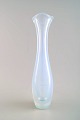 Sven Palmqvist for Orrefors, a Selena vase, circa 1954, blue opaline glass of 
elongated organic form.