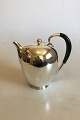 Danam Antik 
presents: 
Georg 
Jensen Sterling 
Silver Coffee 
No 787 with 
Handle og Black 
Wood