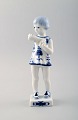 Royal Copenhagen Blue Fluted Plain Figure, Girl with butterfly. 
Number 1/4795.