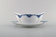 Royal Copenhagen blue painted Princess sauce boat in porcelain. 
Model Number 563.