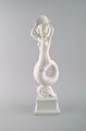 Harald Salomon for Rörstrand, Large and rare blanc de chine / white-glazed 
figure depicting mermaid with seashell on base.