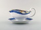 Royal Copenhagen. "Magnolia" sauce boat. Late 20th century.
