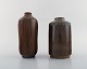 Wallåkra. Two vases in glazed stoneware. Beautiful glaze in brown shades. 
Swedish design 1950