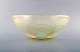 Early René Lalique "Coquilles" bowl in art glass decorated with sea shells. 
Dated before 1945.