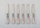 Six Georg Jensen Cactus butter knives in all sterling silver.
