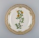 Royal Copenhagen Flora Danica openwork plate in hand-painted porcelain with 
flowers and gold decoration. Model number 20/3554.
