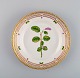 Royal Copenhagen Flora Danica salad plate in hand-painted porcelain with flowers 
and gold decoration. Model number 20/3573.
