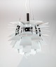 White artichoke, Ø48, designed by Poul Henningsen in 1958 and manufactured by 
Louis Poulsen.
