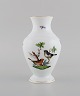 Herend Rothschild Bird porcelain vase with hand-painted birds, butterflies and 
gold decoration. Mid-20th century.
