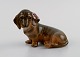 Royal Copenhagen porcelain figurine. Seated dachshund. Model number 3140. Dated 
1964.
