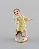 Meissen, Germany. Antique hand-painted porcelain figure. Putti. Approx. 1900.
