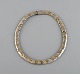 Tiffany & Company, New York. Modernist necklace in partially gilded sterling 
silver. 1970s.
