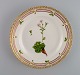 Royal Copenhagen Flora Danica salad plate in hand-painted porcelain with flowers 
and gold decoration. Model number 20/3573.
