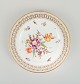 Antique Meissen openwork plate in hand-painted porcelain with flowers and gold 
decoration. Late 19th century.