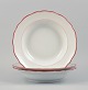 Meissen, three deep plates with orange-red decoration.