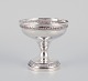 American goblet in sterling silver.Classic design adorned with flowers.