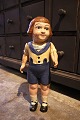 Decorative, old doll in painted papier-mâché with a fine patina. 
H: 47cm...