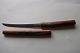 An old paper knife/paper cutter with a handle made 
of wood
The paper knife is good working with
L: 21cm
In a good condition