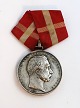 Lundin Antique 
præsenterer: 
Medaljen 
for druknedes 
redning. 
Christian d.lX. 
Indgraveret 
navn utydeligt.