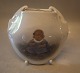 Klosterkælderen 
presents: 
B&G 115 
Wall Vase 
Little girl 
sitting 17 cm 
Signed MH Ida 
Margrethe 
Hyldahl B&G 
Porcelain