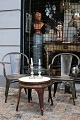 K&Co. presents: 
Classic 
French Tolix 
chair with 
armrests in 
acid-treated, 
polished and 
lacquered 
metal...