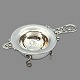 Antik 
Damgaard-
Lauritsen 
presents: 
A Danish 
tea strainer of 
in sterling 
silver