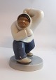 Lundin Antique præsenterer: Bing & Grøndahl. Porcelænsfigur. Stående eskimo. Model 2415. Højde 19 cm. (1 ...