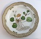 Lundin Antique præsenterer: Royal Copenhagen. Flora Danica tallerken med gennemskåret bort. Diameter 27 cm. ...