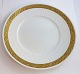 Lundin Antique præsenterer: Royal Copenhagen. Vifte med guld. Middagstallerken. Model 11519. Diameter 25,5 cm. ...