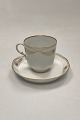 Danam Antik præsenterer: Royal Copenhagen Stel No. 118/2005 Kaffekop med Underkop Påfugl med Guldkant