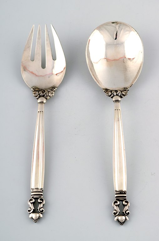 Georg Jensen "Acorn" serving spoon and fork in full sterling silver.
High quality.