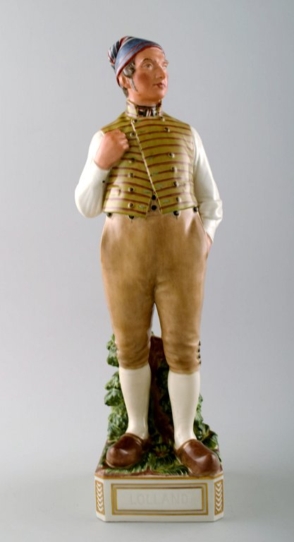 Carl Martin-Hansen: Porcelain figure of male in national dress. 
Royal Copenhagen, Queen Juliana Maria mark. 
Number 12229.