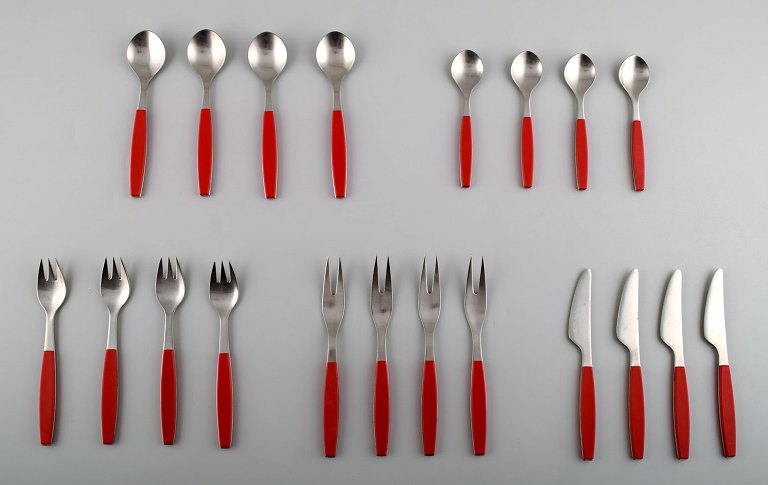 Complete service for 4 p., Henning Koppel. Strata cutlery from stainless steel 
and red plastic. Produced by Georg Jensen.